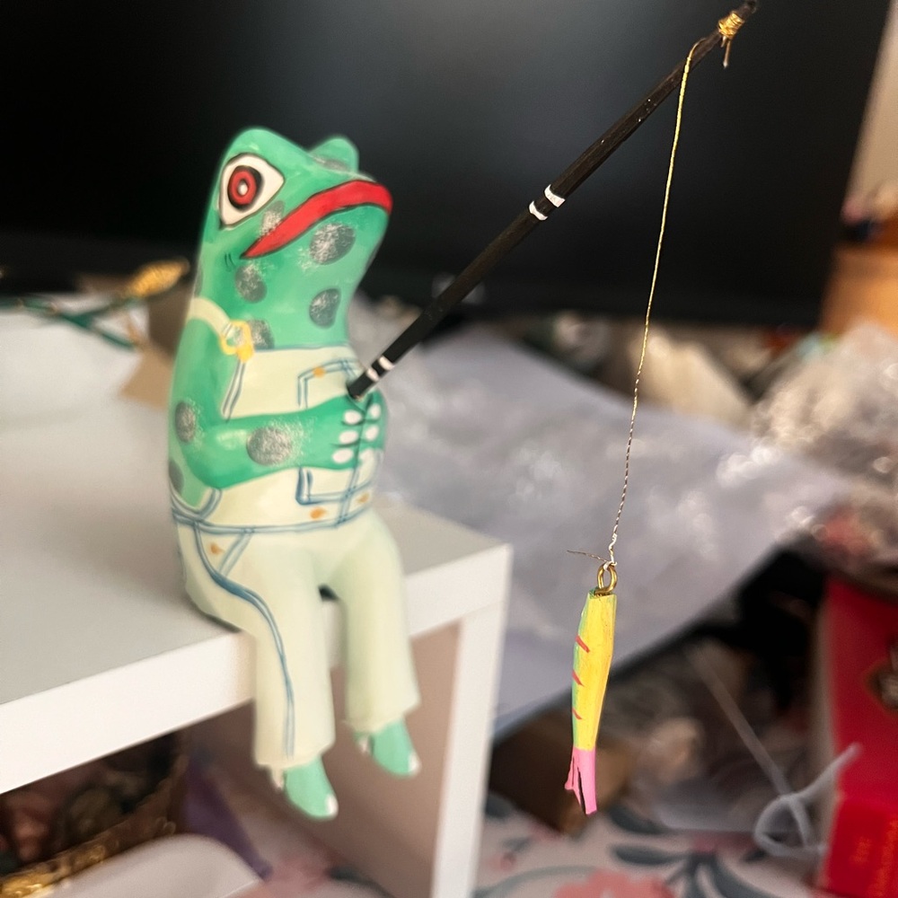 Hand carved frog figurine